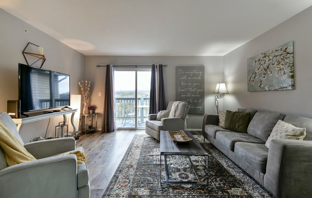 2 Stylish Condos w/ Views | Near SDC — Living room with balcony view